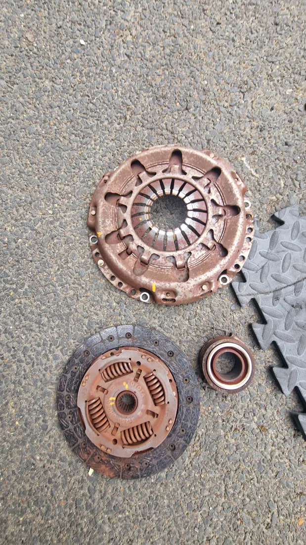 Rusty, glazed clutch kit removed from a car